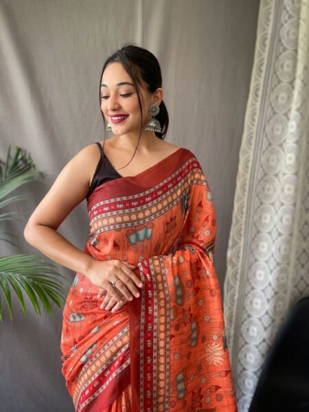 Women's Artistic Terracotta Orange Linen Saree with Kalamkari Inspired Print & Tassel Detailing β Perfect for Casual Festivities & Cultural Events